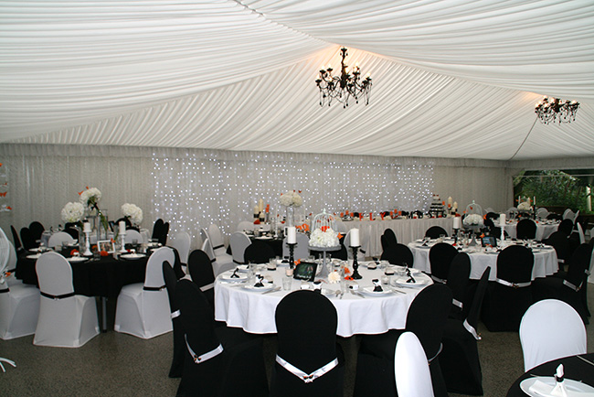 Fountain Gardens fairy light backdrop and chandeliers